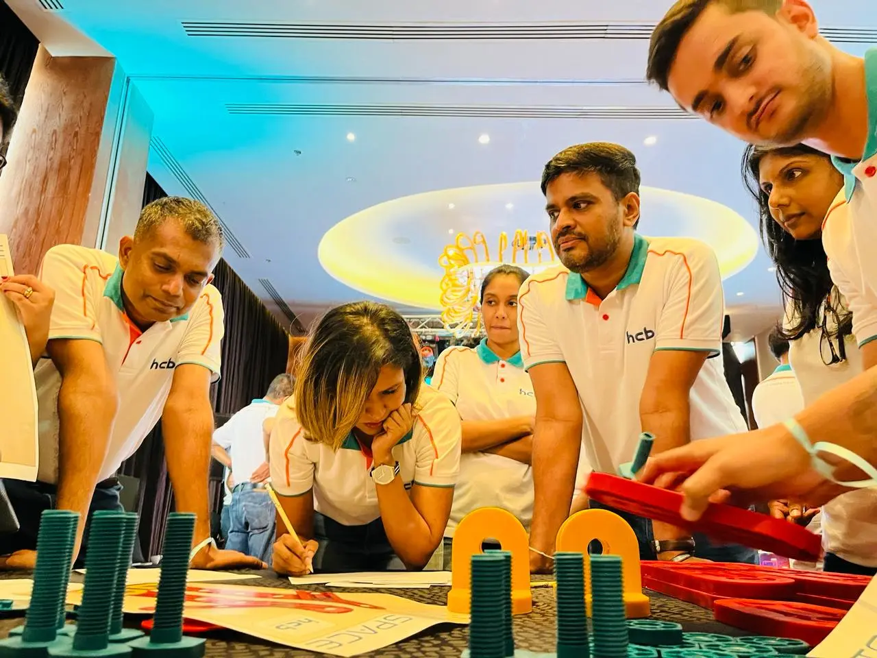 A team working together on an MTa experiential-learning challenge